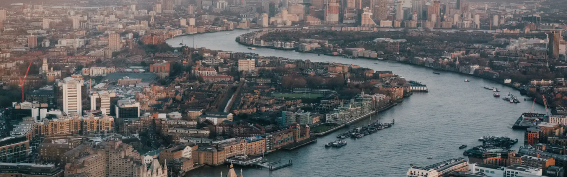 London commercial skyline at dusk — offices and commercial buildings across the City